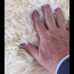 We have here a authentic sheep rug 4 pelts